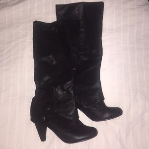 Not rated tall black boots 9.5. Like New